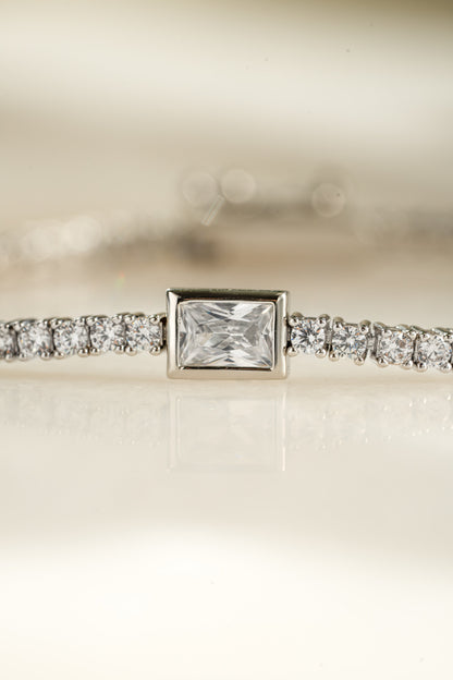Bezeled Emerald-Cut Charm Tennis Bracelet