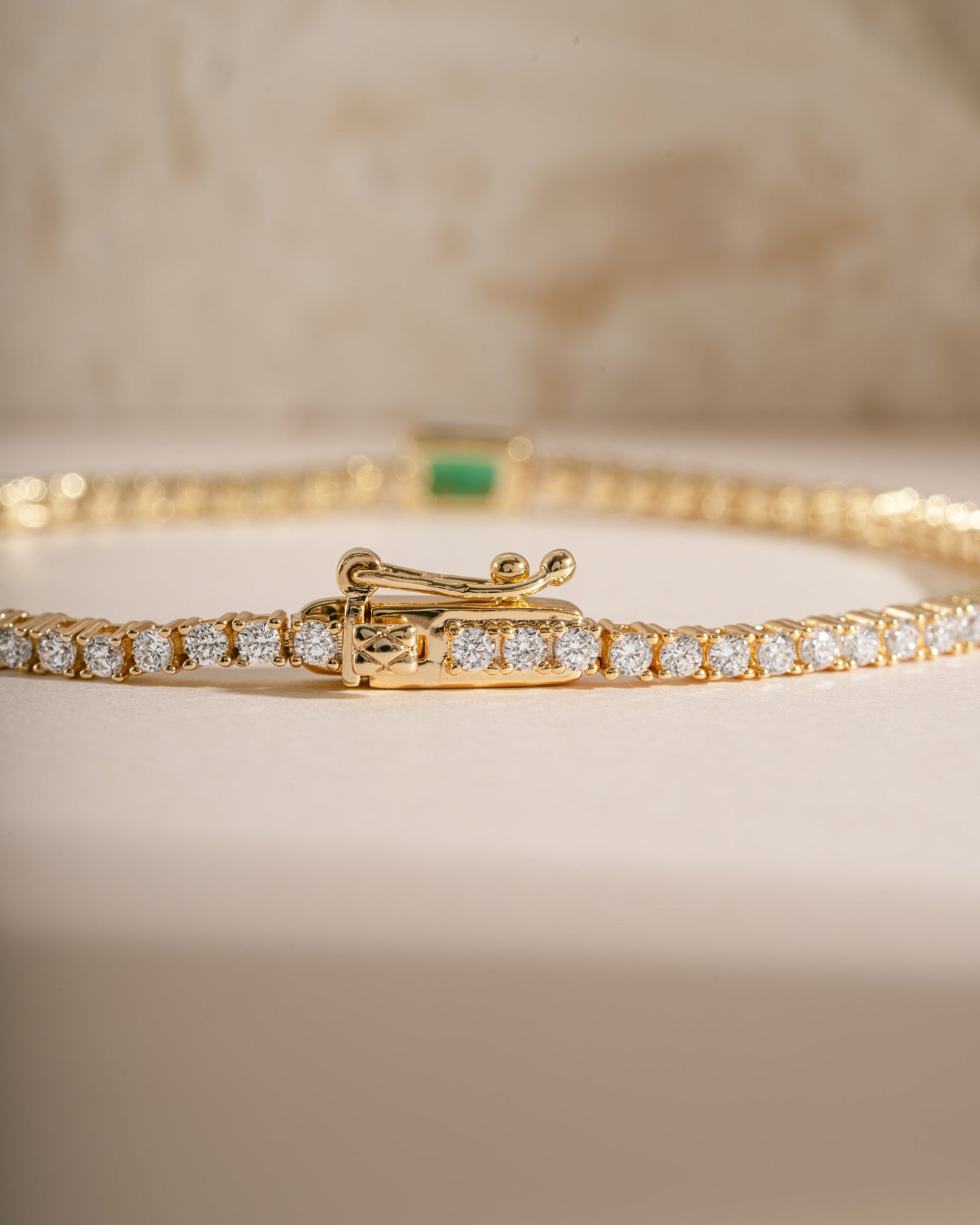 Tennis Bracelet with Emerald Baguette Charm
