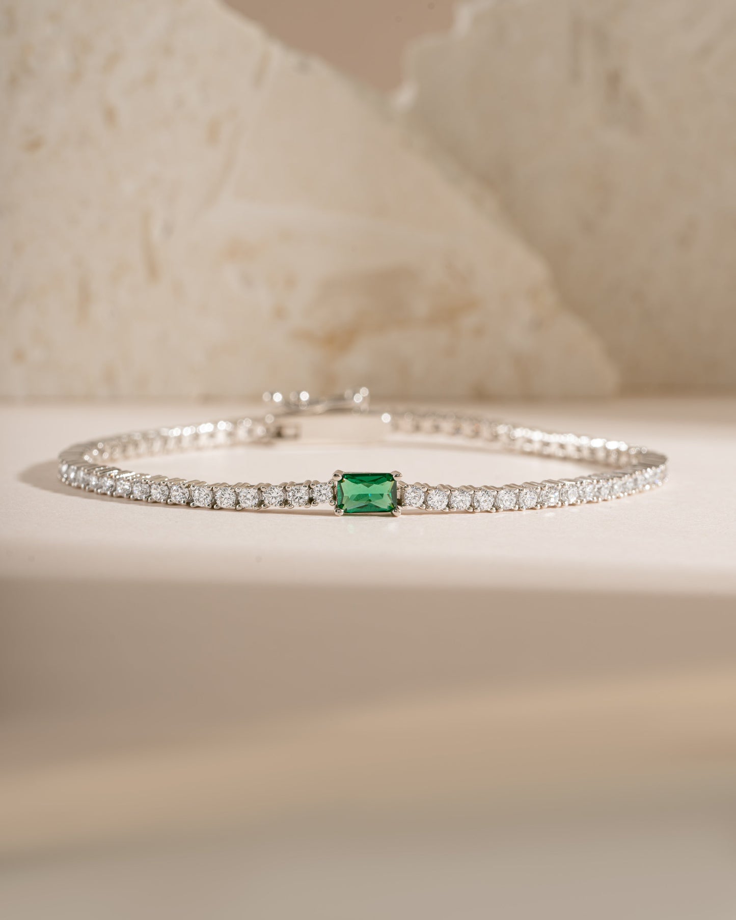 Tennis Bracelet with Emerald Baguette Charm